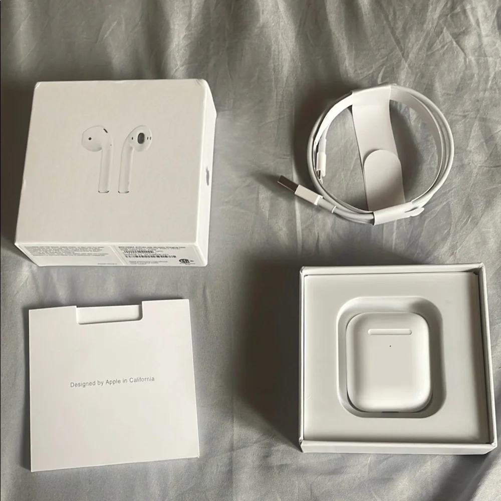 Apple AirPods with Charging Case - White